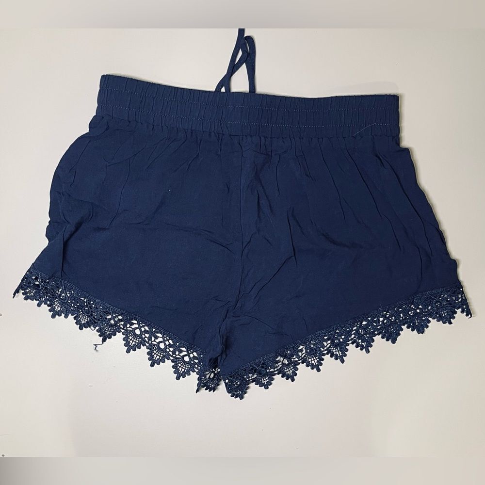 NWOT. Lightweight nave blue lace hem shorts.
